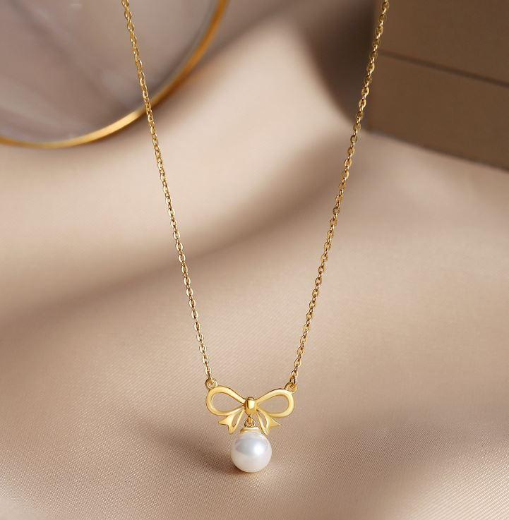 Enchanted Golden Bow and Pearl Elegance Necklace - OneCatBoutique