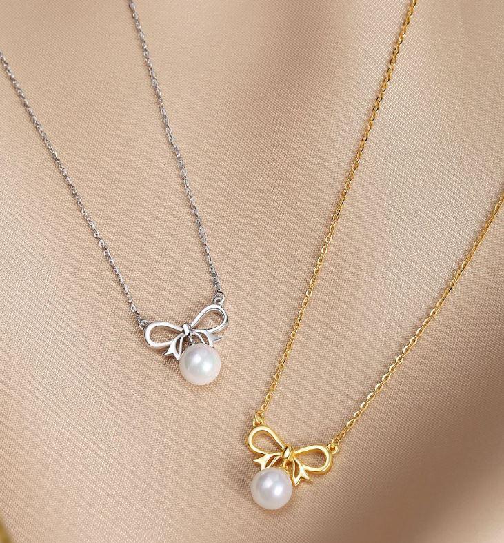 Enchanted Golden Bow and Pearl Elegance Necklace - OneCatBoutique