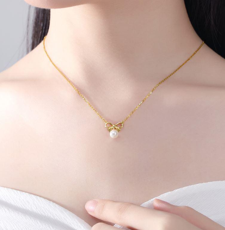 Enchanted Golden Bow and Pearl Elegance Necklace - OneCatBoutique