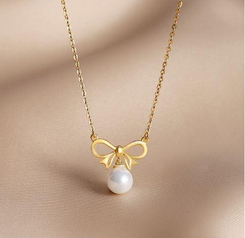 Enchanted Golden Bow and Pearl Elegance Necklace - OneCatBoutique