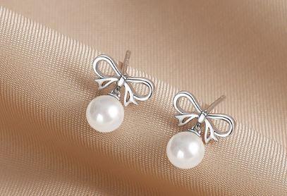 Enchanted Silver Bow and Pearl Stud Earrings - OneCatBoutique